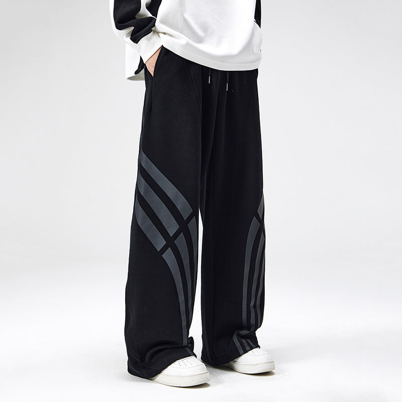 D-vine Striped Stitched Casual Pants in black and grey - front view