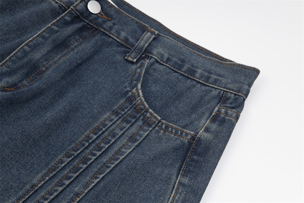 D-vine Side-Ripped Baggy Jeans - fabric texture close-up